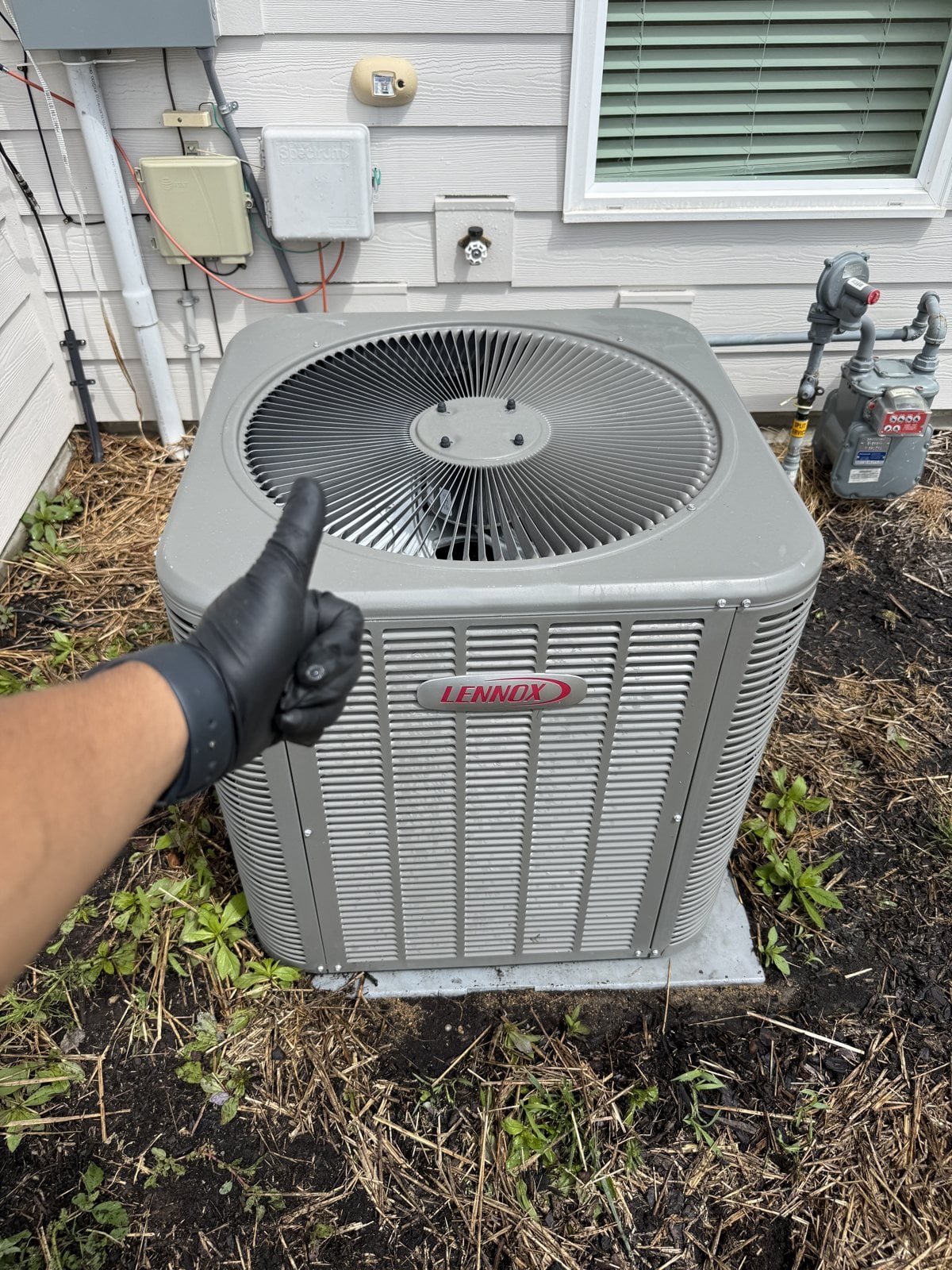 Outdoor condenser unit serviced by Skyline Comfort Services