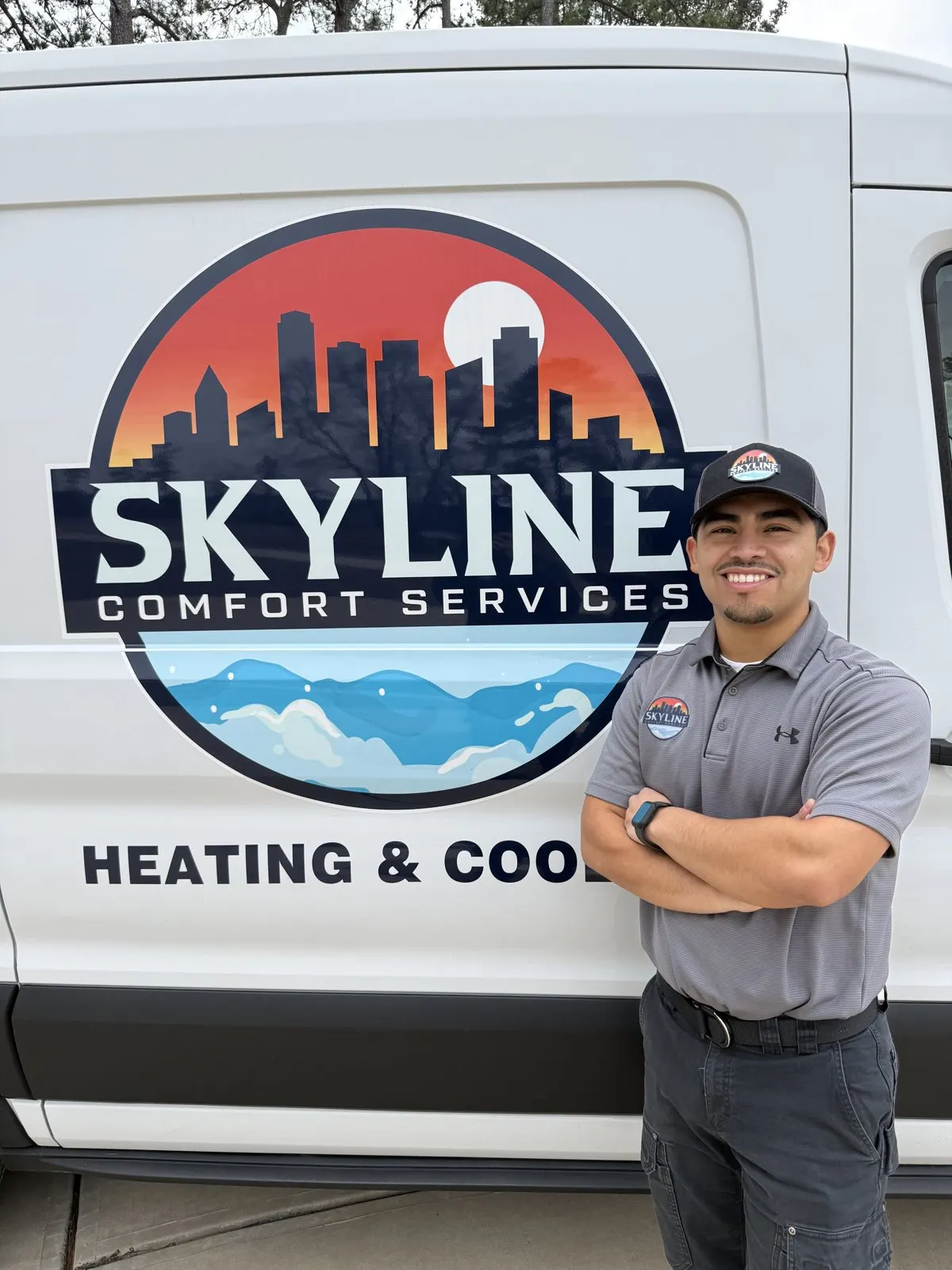 Skyline Comfort Services technician Henry Amaya standing beside company van in Raleigh, North Carolina.